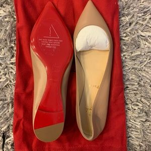Brand new never worn Christian Louboutin nude flats.  Size 39.5